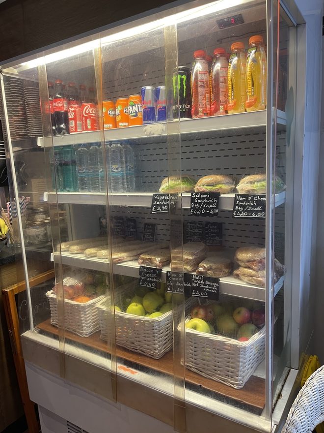 Grab-and-go fridge with sandwiches, drinks and fruit